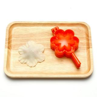 Three flower-shaped dumpling molds