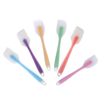 One-piece silicone spatula transparent for making cakes, stirring and scraping cream nougat, a household baking tool